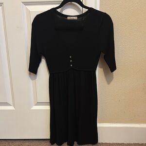 Chic Black Dress with Button Detail